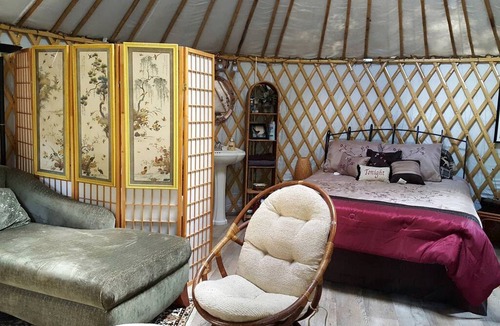 Claxton Cabin | Rustic Luxury: Riverfront Yurt Glamping in Claxton, Georgia
