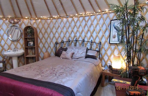 Claxton Cabin | Rustic Luxury: Riverfront Yurt Glamping in Claxton, Georgia