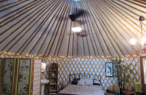 Claxton Cabin | Rustic Luxury: Riverfront Yurt Glamping in Claxton, Georgia