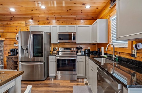 Sevierville Cabin | Rustic Mountain Retreat by Ghosal Luxury Lodging
