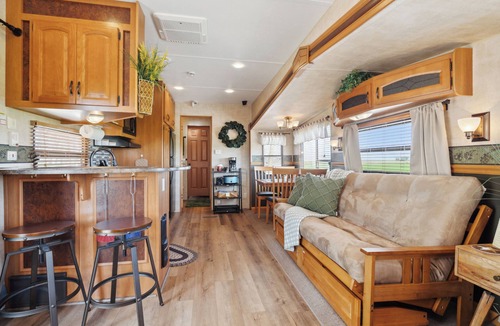 Langworthy RV Rental | Rustic Retreat Camper - on Silver Lake in Delhi. Pet Friendly!