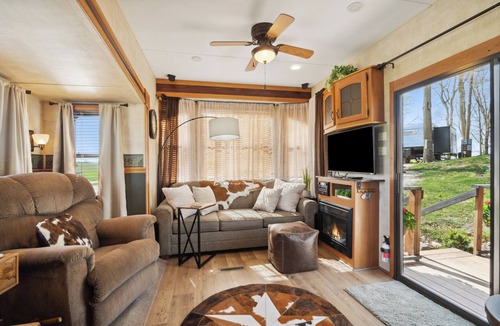 Langworthy RV Rental | Rustic Retreat Camper - on Silver Lake in Delhi. Pet Friendly!