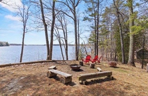 Dresden Cabin | Rustic Riverfront Cabin with Fire pit and Wood Stove