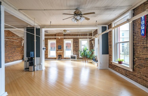 Watertown Apartment | Rustic short‑term hospitality space in Downtown Watertown.