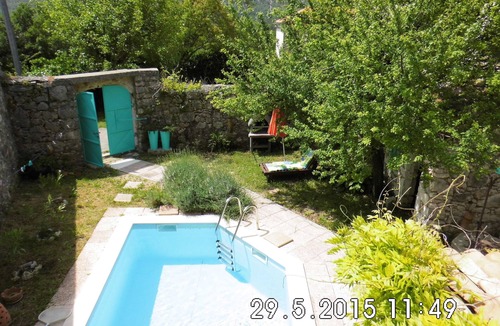 Drivenik House | Rustic stone house with pool