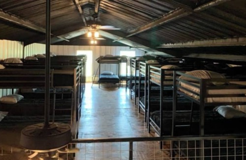Burkett Cabin | Rustic Texas Ranch Lodge Sleeps 45~Private Lake~Exotic Wildlife~Group Getaways