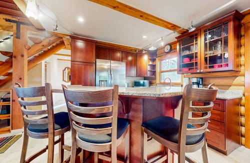 Oak Harbor Ski Chalet | Rustic waterview home, covered deck, vaulted ceilings & updated kitchen