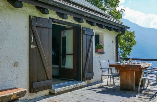 Acquarossa House | Rustico Girasole by Interhome