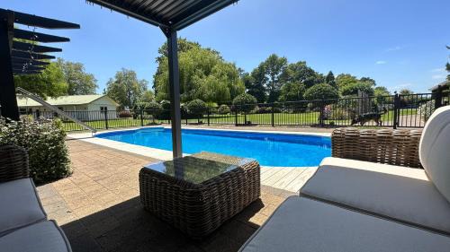 Tamahere House | Rustling Oaks NZ Boho Pool House