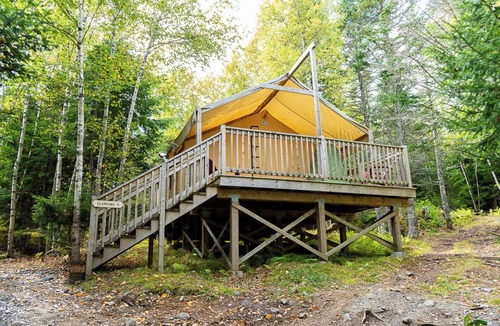Saint Patrick RV Rental | Safari Glamping Tent | Forest Retreat & Hot Tubs!