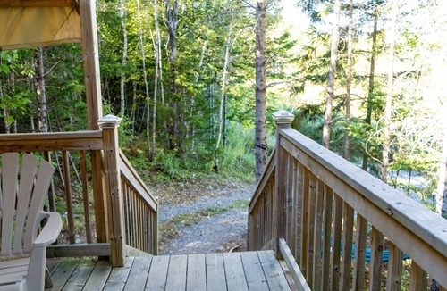 Saint Patrick RV Rental | Safari Glamping Tent | Forest Retreat & Hot Tubs!