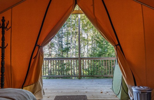 Saint Patrick RV Rental | Safari Glamping Tent | Forest Retreat & Hot Tubs!