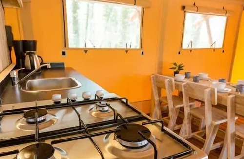 Cahagnolles House | Safari tent 49 m² with sanitary facilities + terrace 15 m² 6 persons