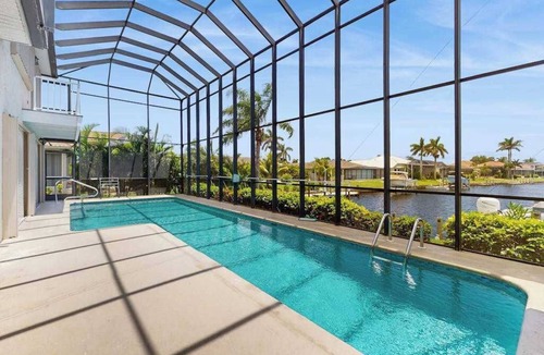 Burnt Store Isles House | Sailboat-Access Waterfront Retreat with Sunset Pool Living