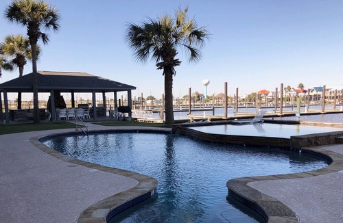 Port Arthur Condo | SALT LIFE Waterfront on Sabine Lake With Pool