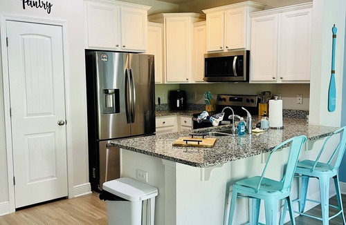 Thomas Drive House | Salty Kisses - 3 miles to beach, pool, gameroom theater room, close to Pier Park