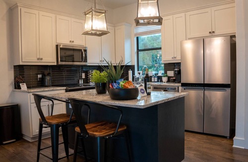 Waterford On Lake Travis House | Sanctuary On Lake Travis with private pool and outdoor jetted tub with golf cart