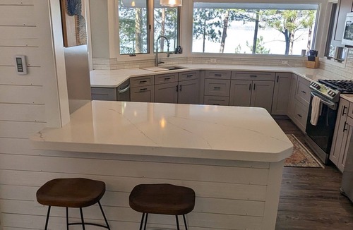 Higgins Lake House | Sand beach at your doorstep