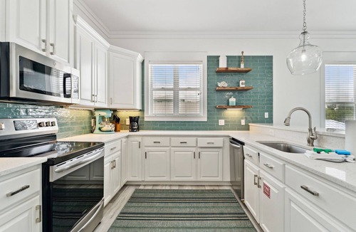 Delos House | Sandborne Pool Oasis, Steps to Private Beach!