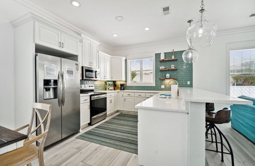 Delos House | Sandborne Pool Oasis, Steps to Private Beach!