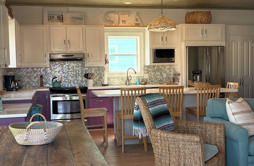 Sand Point House | SandPoint steps to beach,boardwalk,shared heated pool&hot tub,golf cart friendly