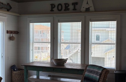 Sand Point House | SandPoint steps to beach,boardwalk,shared heated pool&hot tub,golf cart friendly