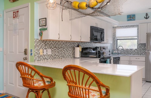 Holmes Beach Condo | Sandy Cheeks & Barefeet, Gorgeous interior Gulf beach Place, pool, on beach side