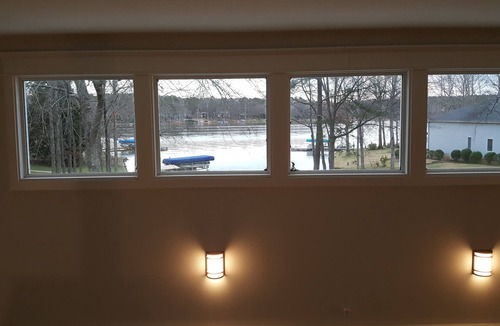 Eatonton House | Sandy Cove Lake Front House - Yard, Dock & Natural Sandy Beach on protected cove