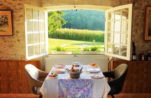 Luzille Bed & Breakfast | Sans Souci Bed and Breakfast with Luxe Heated Pool