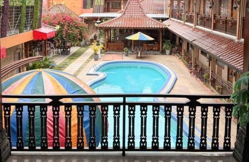 Depok Hotel | SANS Vibes Sartini Inn Yogyakarta