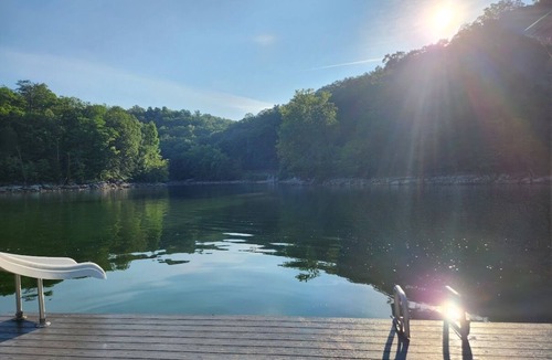 Caryville Cottage | Sapphire Cottage - Waterfront w/Covered Dock & Slide, Gentle Slope to Water