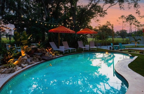 Whitfield House | Sara Bay Base Camp: Private Tropical Oasis, Pool, Golf, Bocce, Firepit, PETS