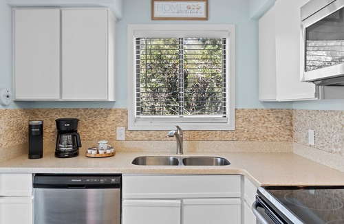 Caswell Beach Condo | Scenic Caswell Beach! 3 Mins to Beach & Pool. Clean + Conveniently Located