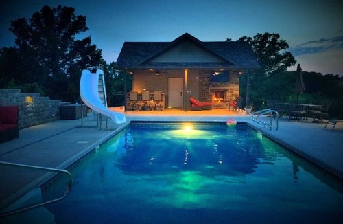 Belle House | Scenic Lakeside Chateau with Heated Pool, Hot Tub & Outdoor Kitchen-TV-Fireplace