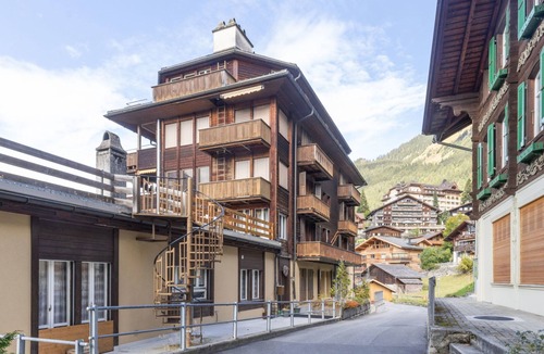 Wengen Apartment | Schweizerhof Apt. B by Interhome