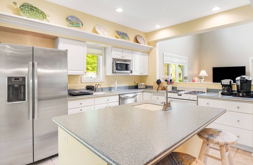 Bethany Beach House | Sea Colony Tennis townhouse with screened porch basketball, pool, & gym
