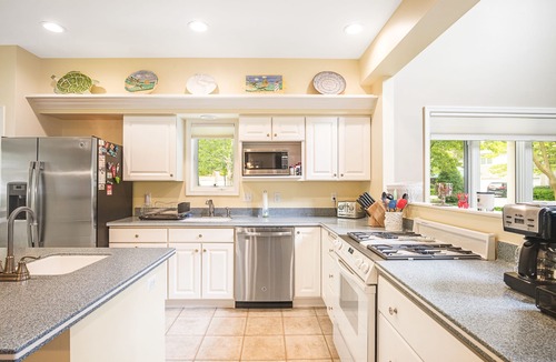 Bethany Beach House | Sea Colony Tennis townhouse with screened porch basketball, pool, & gym