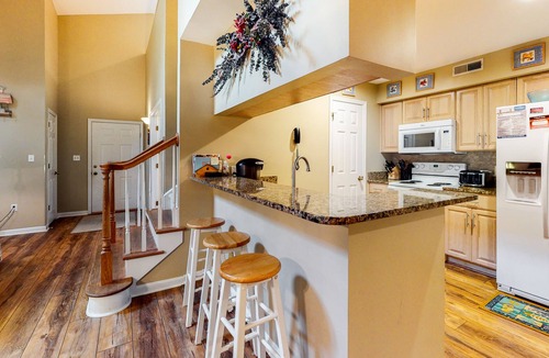 Bethany Beach Condo | Sea Colony Tennis 2nd-floor condo with tennis/basketball, 3-season room, & AC