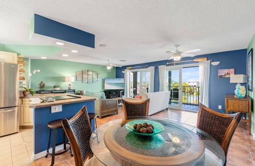 New Town Condo | SEA-NIC VIEW ~ 2 BR/2Ba Water-front views, Pool Access and Dockage!