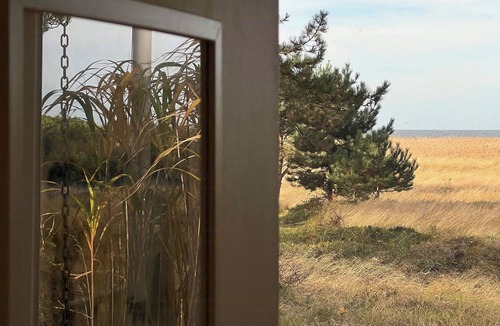 Hoeve Strand House | Sea view over heather and reeds near Sejerø Bay