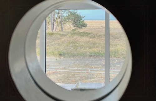 Hoeve Strand House | Sea view over heather and reeds near Sejerø Bay