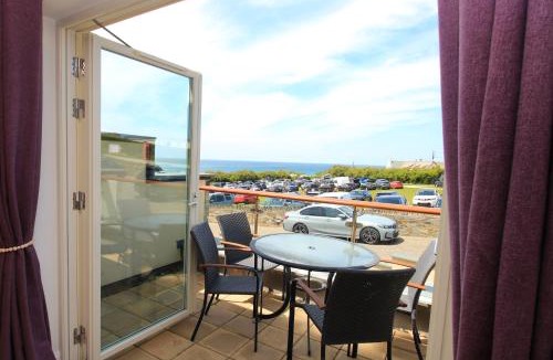 Treyarnon Apartment | SEA VIEWS, beachside apartment with balcony