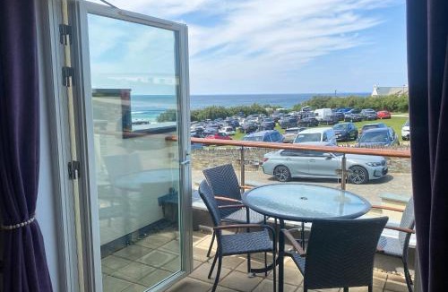 Treyarnon Apartment | SEA VIEWS, beachside apartment with balcony