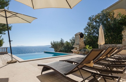 Okrug Gornji Villa | Seafront villa with heated swimming pool, teak deck, open sea view, boat mooring