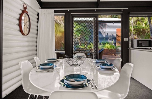 Macmasters Beach House | “Seas The Day” – Pool & Fireplace