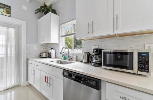 Dolphin Isles Apartment | Seashell~Walk To The Beach~Comfy Beds~Firepit~Pool
