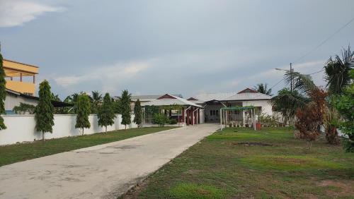 Sungai Besar House | Seaside cottage room stays