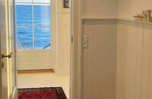 Nyborg House | Seaside hotel-inspired home with sea view
