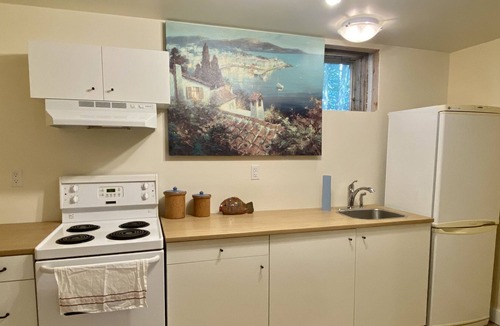 French Village Apartment | Seaside Sanctuary, 3-min walk to Micou’s Island Beach!