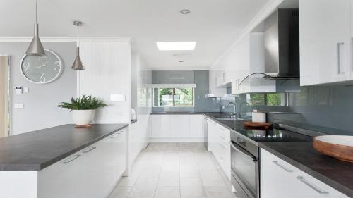 Salamander Bay House | Seaside Sanctuary - Waterfront Luxury Home with Heated Pool